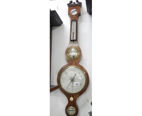 A 19th century wheel barometer with swan neck pediment