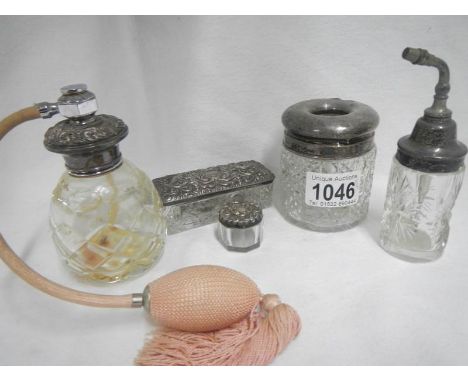 A silver topped perfume atomiser, hair tidy pot, rouge pot, trinket glass etc