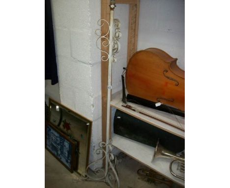 A painted standard lamp