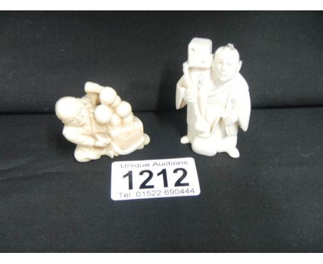 An ivory netsuke of entertainer with NOH mask and dice together with an ivory netsuke of man playing with balls