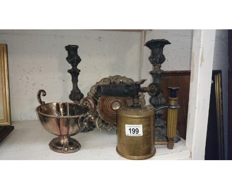 A pair of Victorian silver plate on pewter candlesticks and a brass blow lamp