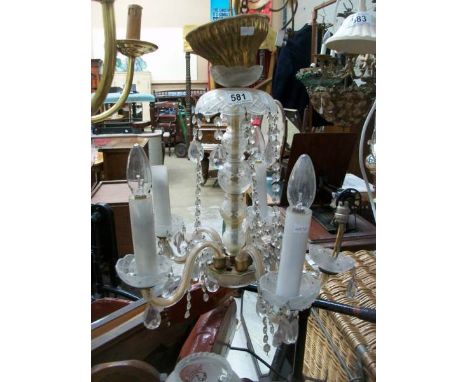 A 5 lamp ceiling light with droppers