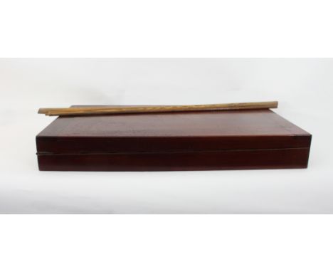 A 19th Century mahogany table-top billiard board, the base baize-lined and with numbered boxwood recess complete with cues, a