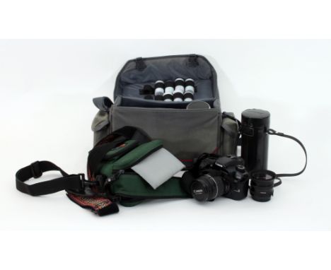 A Canon A1 camera, a Canon EOS 30 camera, various lenses and other photographic equipment