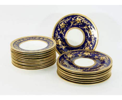 A set of nine Cauldon dinner plates, gilt and dark blue, and twelve Minton soup plates of similar decoration Condition Report