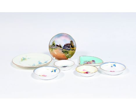 A collection of six Royal Worcester pin trays and a Coalport pin tray (7)