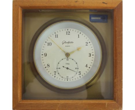 A German quartz marine chronometer by Uhrenwerk Glashutte, No 1766, in a mahogany deck box, 20cm wide Condition Report: The l