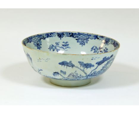 A Delft blue and white bowl, circa 1780, decorated an island pavilion, 31cm diameter Condition Report: Restoration to base an