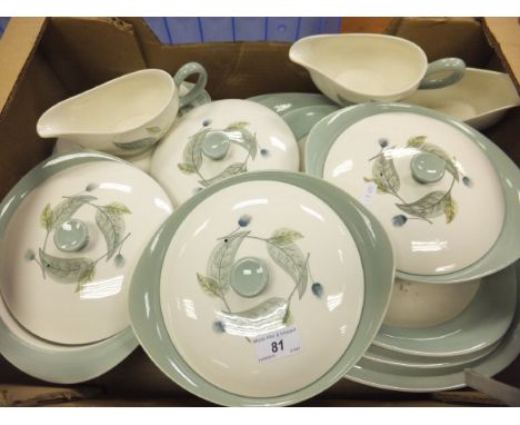 A collection of Wedgwood "Woodbury" pattern dinner wares to include three lidded tureens, graduated meat plates, gravy boats,
