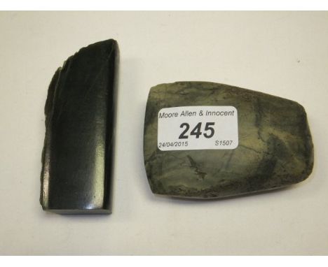 A Neolithic green stone axe head, together with a green stone polished section 
 CONDITION REPORTS Axe approx 8.25cm long x 5