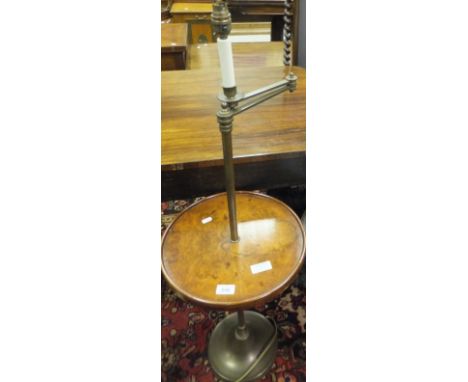 A modern Vaughan Lighting standard lamp with adjustable candle type sconce and burr walnut table centre, on a brass pedestal