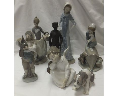 A Lladro figure of a gentleman in Tyrolean dress, a Lladro figure of an angel, Lladro figure of a girl with geese, model No. 