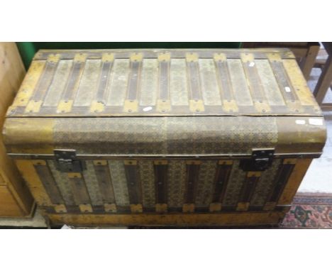 A Spanish dome top trunk with all-over repeating pattern decoration