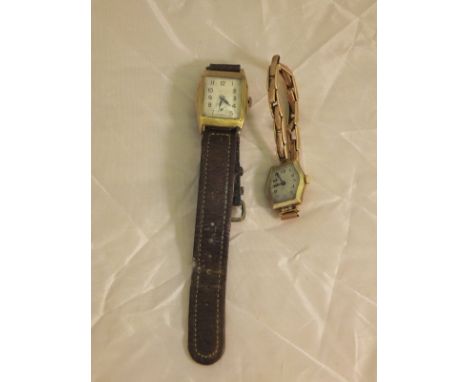 A 9 carat gold cased wristwatch, the engine turned dial set with Arabic numerals, together with a further 9 carat gold cased 