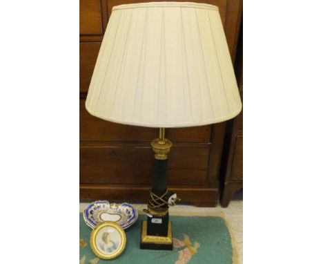 A 20th Century French bronzed and gilt embellished table lamp in the Regency taste, inscribed "Par Brevet...", together with 