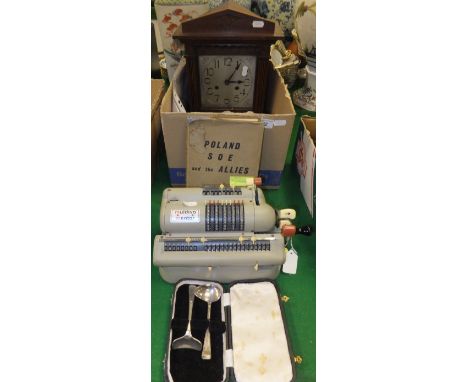 A Muldivo Mentor counting machine, oak cased mantel clock with Arabic numerals to dial, "Poland Sot and The Allies" by Jozef 