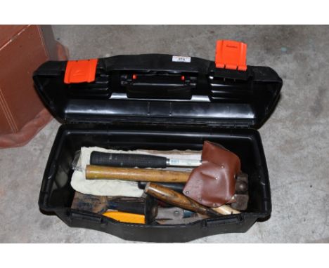 A black plastic tool box containing miscellaneous tools, to include hammer, axe, masonry chisel etc. CONDITION REPORT: All in