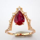 18K rose gold ring. Detailed with Ruby and brilliant diamonds.