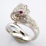 An exquisite snake ring intricately detailed with brilliant diamonds and 18k gold