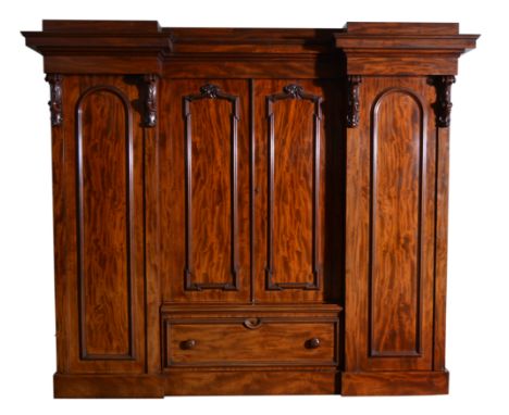 Victorian mahogany wardrobe, inverted breakfront with a moulded cornice, plain frieze, two central doors enclosing shelf, sli