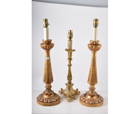 Silver plated Corinthian column table lamp, height 47cm to fitment and three giltwood table lamps, (4).