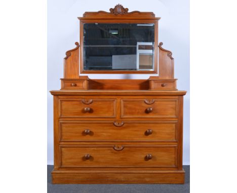 Victorian mahogany dressing table, carved pediment, rectangular adjustable mirror with bevelled plate above trinket drawers, 