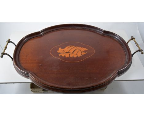 Edwardian mahogany tray, oval marquetry shelf inlay, brass handles, length 27cm.