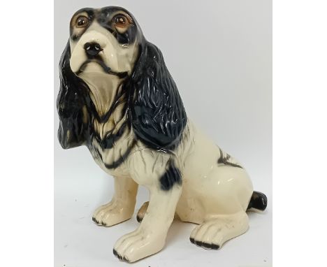 A large ceramic dog, King Charles Spaniel, height approx 39cm.