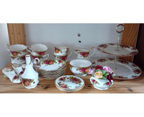 A Royal Albert Old Country Roses tea service, to include 6 teacups and saucers, cake stand, milk jug, sugar bowl, tea pot, sm