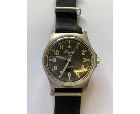 A Stainless Steel cased Precista Quartz wrist watch marked to the reverse with a government arrow W10/6645-99-541-5317 12412/