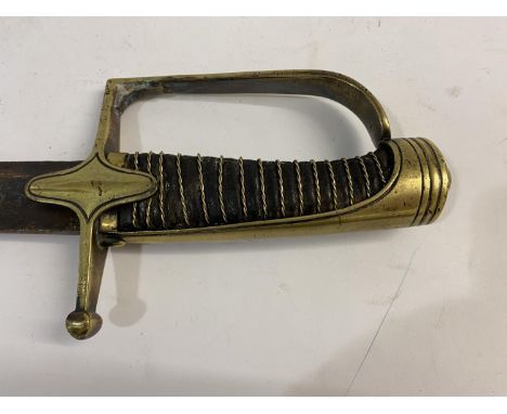 A 19th Century French Cavalry Sword with an 80cm curved single edged blade with long fuller, with a straight brass guard, wir