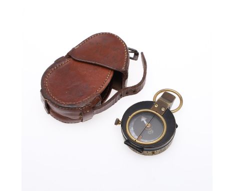 A First World War Compass numbered 574005 and 15206, with Government issue arrow. The leather case named to V.T. Payne Middx 