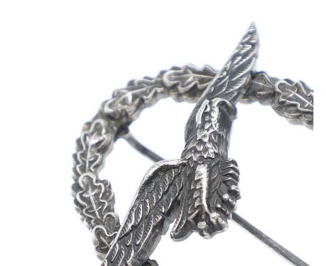 A Second World War German Luftwaffe Glider Pilot' Badge, an early example, the eagle with a makers mark to the reverse 'C E  