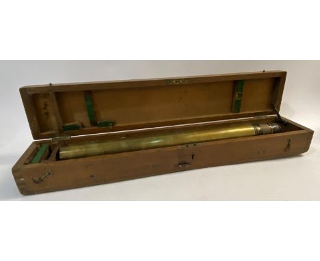 A brass bodied gun sight by W. Ottway and Co. Ealing 1909, 5 to 65cm long, in wooden travelling caws and a pair of German bin