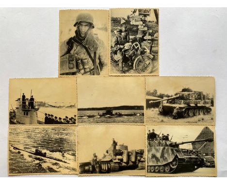 A collection of eight black and white photographs, 8 x 11.5 cm with deckled edges, three images of U-Boats, three of tanks, o