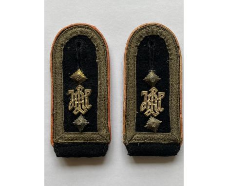 A pair of Second World War German Waffen-SS senior NCO's shoulder straps, with black felt top side and fieldgrey to the botto