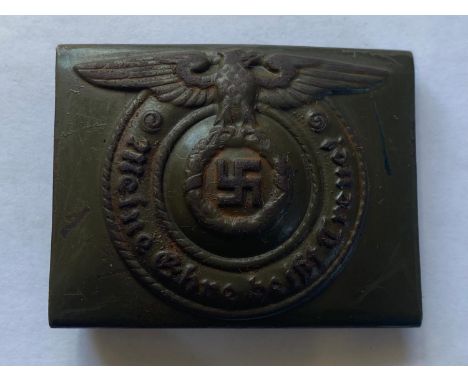 A Second World War German Waffen-SS Man's Belt Buckle, green painted steel type on the remains of a belt section.  *CR:  Slig