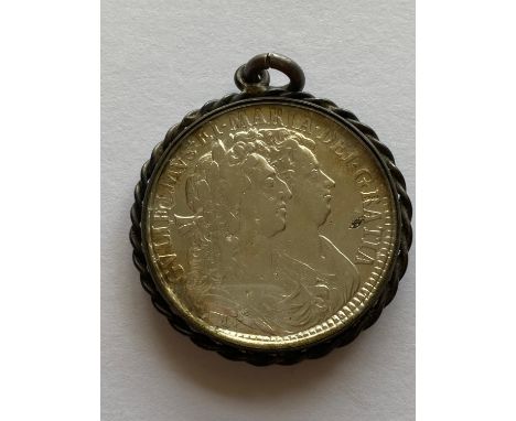 A William and Mary Halfcrown, conjoined busts r. first reverse with crowned shield, 1689. In a locket mount with suspension l