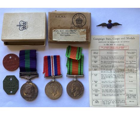 A second World War Defence and War Medal with dog tags named to M.D. Mallaband Offr. C.E. 105804 RAFVR, in original delivery 