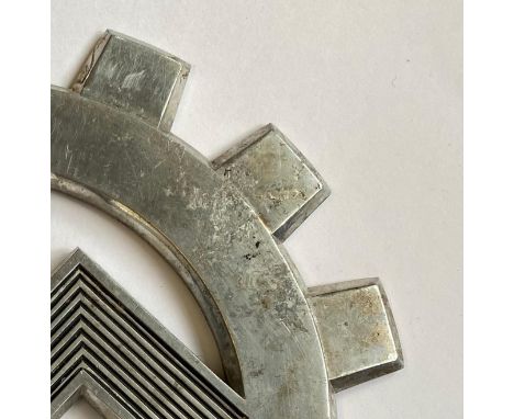A German DAF Labour Front, Deutfche Arbeitsfront, banner top or flag pole finial, pressed alloy with a swastika inside a cogg