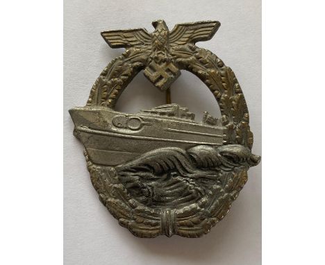 A Second World War German Kriegsmarine E-Boat Badge, 2nd type. Probably a late War example in zinc. With a make's mark a 'W' 