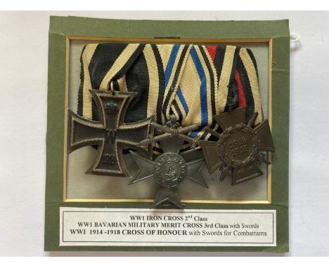 A group of three comprising Iron Cross 2nd Class, Bavarian Military Merit cross, 3rd class with combatants crossed swords and