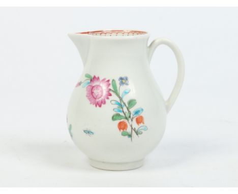 A Worcester sparrow beak cream jug with grooved loop handle. Painted in coloured enamels with flowers and insects under a red