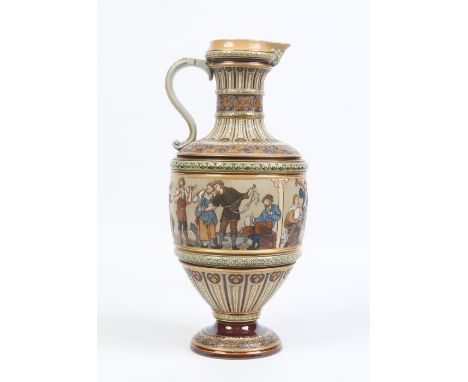 A large Mettlach pottery ewer. Decorated with moulded bands and with a continuing scene of Sgraffito style decoration depicti