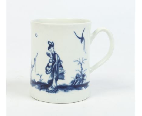 A Worcester cylindrical mug with moulded loop handle. Painted in underglaze blue with the Walk in the Garden pattern. Hatched
