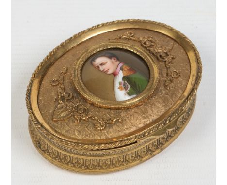 A French gilt brass oval trinket box set with a porcelain portrait plaque of Napoleon Bonaparte, 9.5cm wide. Condition Report
