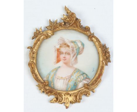 A Continental ivory portrait miniature in gilt gesso frame. Depicting a woman wearing a bonnet and heightened in gilt. Signed