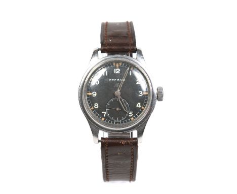 A British Military issue Eterna W.W.W. stainless steel manual wristwatch. With black dial having broad arrow mark, Arabic num