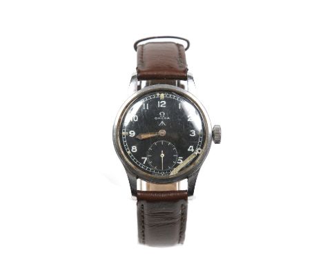 A British Military issue Omega W. W. W. stainless steel manual wristwatch. With black dial bearing the broad arrow mark, Arab