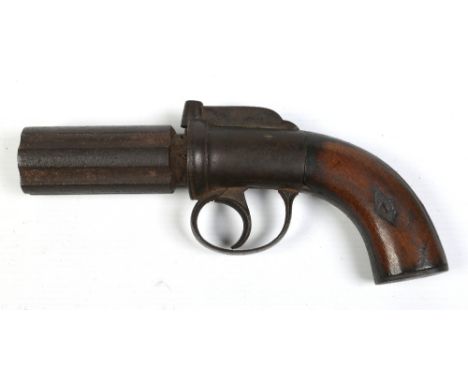 A nineteenth century six shot pepperbox revolver with bar hammer and walnut grip scales. Bore 9mm diameter, barrels 8cm Condi